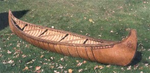 old-form  high ended Algonquin Indian birchbark canoe; this style inspired the high rounded ends of the French Fur Trade birchbark canoes and pre-dates the more modern Wabanaki style of the late 19th and early 20th centuries