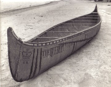 25' fur-trade birch bark canoe '' THE QUEBEC '' built for the regatta in honor of the Prince of Wales in 1860 ; it features the tribal Algonquin bow profile rather than the usual fur-trade end ; photo Rick Nash, 1972