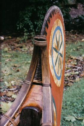 The joining of the gunnel ends of a fur-trade type birchbark canoe with decorative root lashings  ; made by Henri Vaillancourt  2004