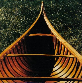 Interior view of 14' flare-sided St. Lawrence River type Malecite Birch bark canoe ; the wide and close ribbing of this canoe is a common feature of Malecite canoes .