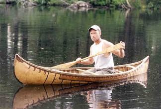 A 10' St. Lawrence River Malecite birch bark canoe. These small canoes were used primarily for hunting and fishing in out of the way places ; weighing from 20 to 30 lbs., they could be carried easily for miles .