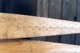 close-up of a section of canoe paddle blade decorated with traditional Malecite Indian style incised line decoration